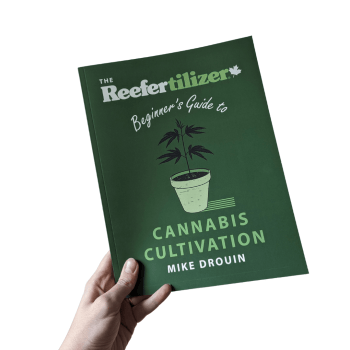 The Beginner's Guide To Cannabis Cultivation Book in Hand